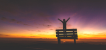 San Marcos at Sunset with Girl looking out on while standing on bench