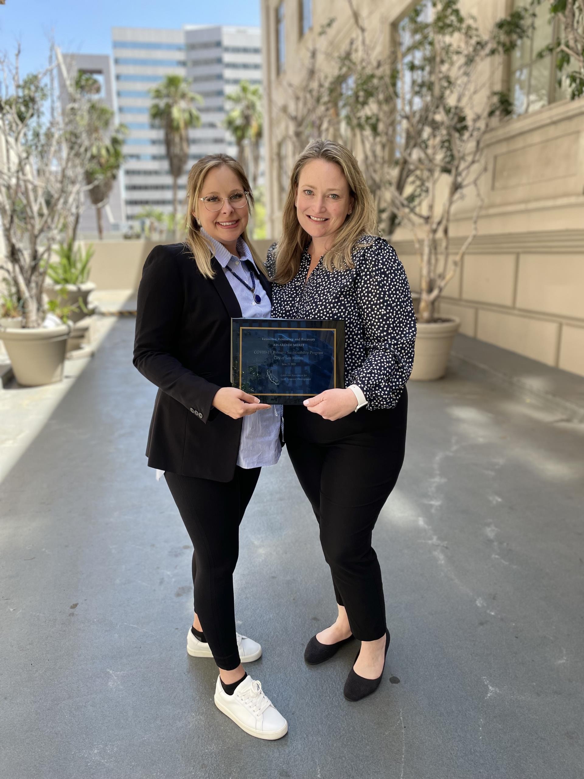 City staff accepting 2023 CALED Award for Economic Resiliency and Recovery.