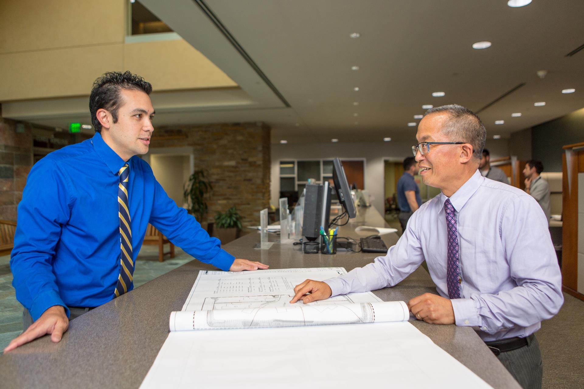 San Marcos staff at counter making it easier to process permits